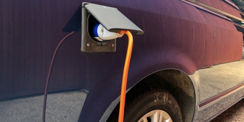 Volkswagen camping van with electric hookup for hire.